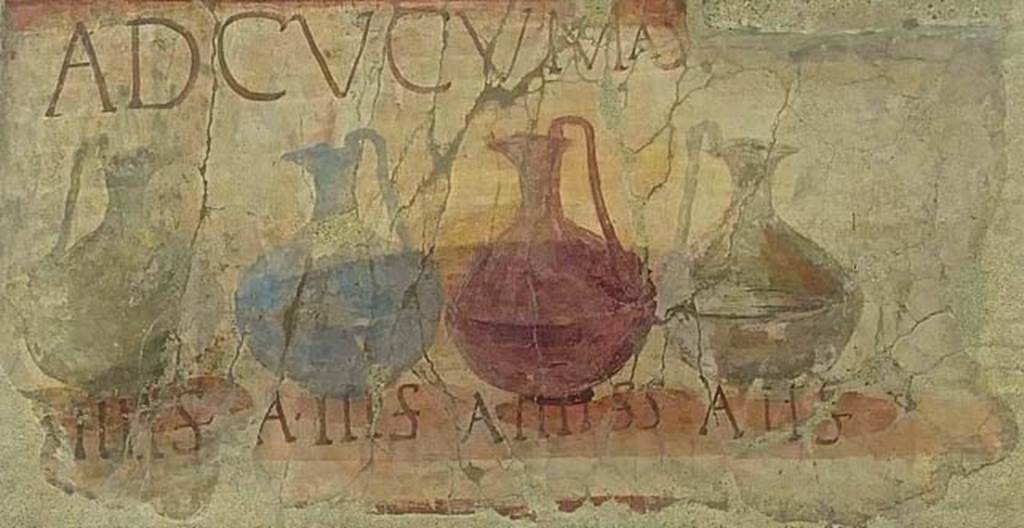 VI.13/14 Herculaneum, June 2017. Enhanced part of the shop sign showing four jugs of different colours, naming and pricing the drinks sold here together with the shop sign AD CVCVMAS (Ad Cucumas), written above the jugs.
Photo courtesy of Michael Binns.